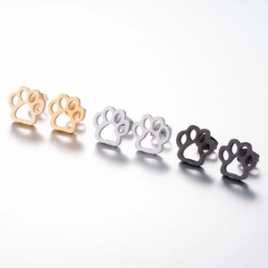 Three pairs of stainless steel bear paw cutout stud earrings in gold silver and black