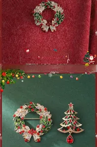Detail of Christmas wreath and tree brooches with red and green rhinestones on gold alloy