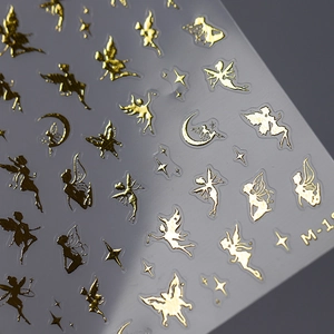 Golden fairy and star nail stickers with mirror finish on a professional display