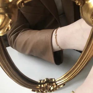 Elegant 18K gold plated titanium bracelet with sparkling round cubic zirconia stones
