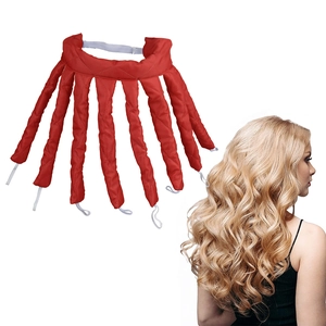 Detail view of red octopus heatless hair curler showing fabric texture and curling results