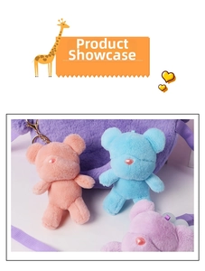 Detail of plush bear charms with heart nose and gold keychain in pastel macaron colors