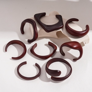 Retro acrylic irregular geometric resin bangles in deep reddish brown finish