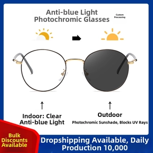 Detail of photochromic anti-blue light glasses showing indoor clear and outdoor tinted lenses