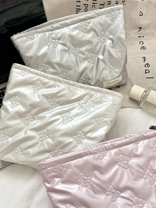 Quilted heart PU leather cosmetic pouch set in silver, white, and pink finishes