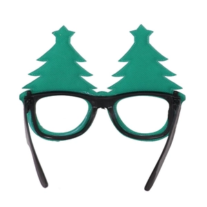 Detail of festive green Christmas tree glasses frame for kids holiday party decoration
