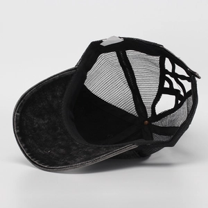 Black washed denim ponytail baseball cap with crisscross elastic bands and mesh back
