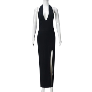 Front view of black backless halter dress featuring deep V-neck and high side slit detail