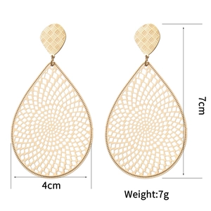 Detailed size view of gold teardrop hollow earrings measuring 7cm in height and 4cm in width