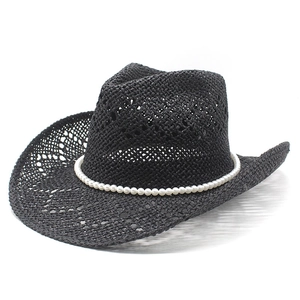 Vintage black woven wide-brim straw cowboy hat with elegant white pearl beads trim
