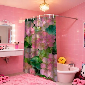 Detailed close-up of the floral shower curtain featuring pink flowers and green leaves