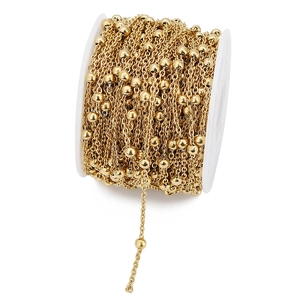Macro shot of 4mm gold beaded stainless steel chain spool for DIY jewelry making