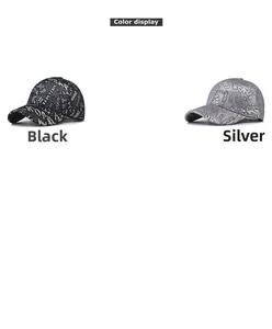 Detail view of fashion baseball caps in black and silver with all-over graffiti text patterns