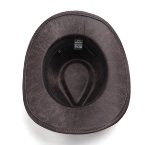 Detail of western fedora hat interior showing the size 57cm label and brown faux suede material