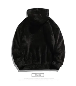 Close-up of the thick double-sided plush texture on this black hooded sweatshirt