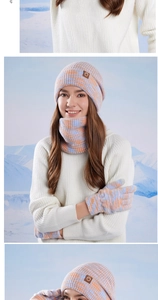 Detailed knit texture of a 3-piece winter hat, scarf, and glove set in macaron colors