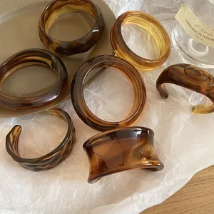 Retro amber acrylic round open cuff bracelet with geometric tortoiseshell resin design
