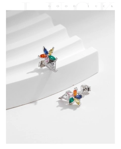 Close-up of S925 silver flower earrings with multi-color cubic zirconia on white background