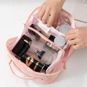 Pink quilted portable makeup bag with large capacity and waterproof travel storage