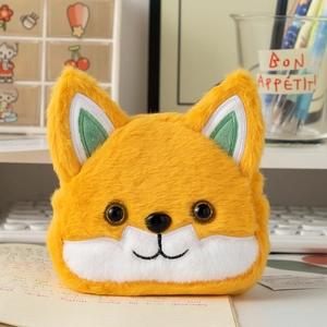 Cute cartoon fox plush coin purse for storage on a cozy student desk setup