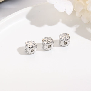 Set of silver square beads with floral engraving and center hole for DIY jewelry