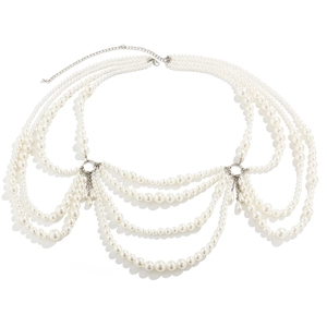 Detail of multi-layer pearl body chain with silver metal links on white background