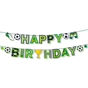 Close-up of a soccer-themed HAPPY BIRTHDAY banner with green, black, and white sports icons