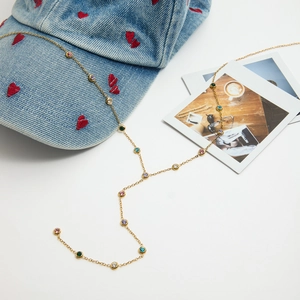 Gold Y-shaped titanium steel necklace with colorful rhinestones and tassel accents