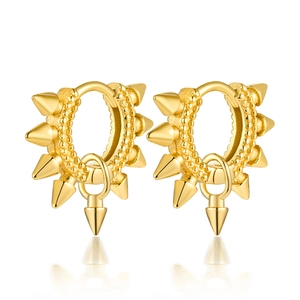 Macro shot of gold pointed spike hoop earrings with a polished punk style finish