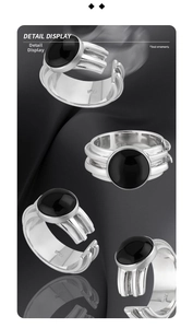 Macro detail of S925 sterling silver ring band with oval black agate and retro textures