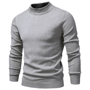 Detail of light grey men's slim fit knit sweater showing fine texture and thick fabric