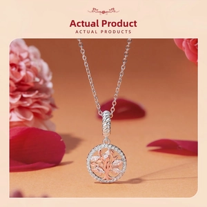 Close-up of S925 tree of life pendant with marquise crystals on a silver chain