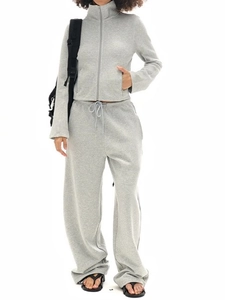 Gray two-piece vintage tracksuit with high neck zip jacket and wide-leg jogger pants