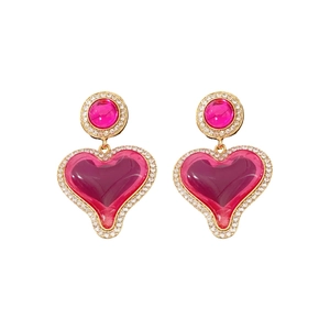 Elegant vintage heart-shaped earrings with rose red stones and gold diamond accents