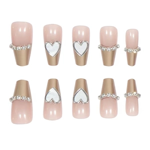 Nude pink and champagne gold long trapezoid press-on nails with metal lines and rhinestones