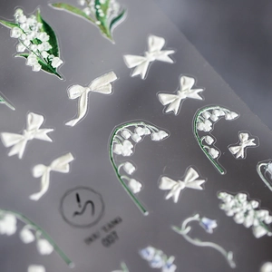 Stickers nail art 5D en relief avec motifs de muguet et de nœuds blancs