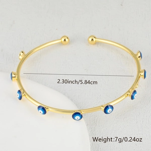 Detail view of evil eye open bangle with dimensions 2.30 inch and weight 7g labels