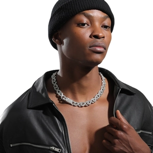 Hip hop style silver diamond-encrusted Cuban link necklace worn by fashion male model