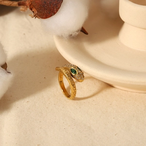 Vintage 18k gold plated snake ring featuring green gemstone eyes and sparkling zircon