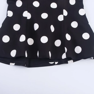 Sexy black halter top with white polka dots and a decorative bow tie for women