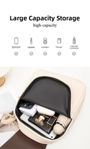 Detailed internal view of beige leather backpack showing high-capacity storage for daily items