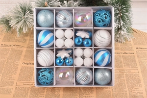 Close-up of 16 assorted blue and silver Christmas ornaments with star and ball shapes