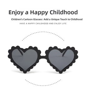 Detail of heart-shaped kids sunglasses featuring unique wavy texture on the black frames
