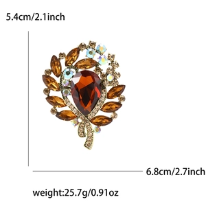 Detail view of retro alloy brooch with amber crystals, size 5.4x6.8cm and weight 25.7g