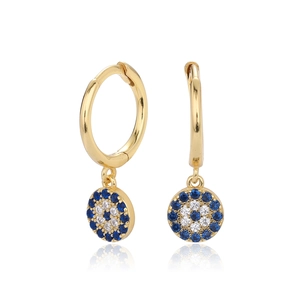 Macro shot of gold Evil Eye hoop earrings with blue and white pavé cubic zirconia