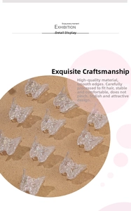 Detail view of mini laser butterfly hair clips with iridescent acrylic texture