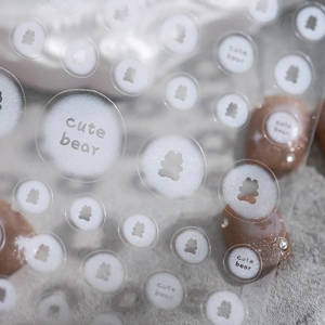 Minimalist 5D nail art stickers featuring cute bear silhouettes and bubbles on dark nails