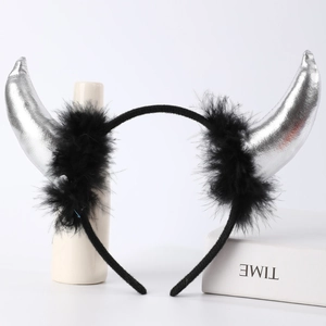 Detail of silver devil horn headband with black feather trim for Halloween party cosplay