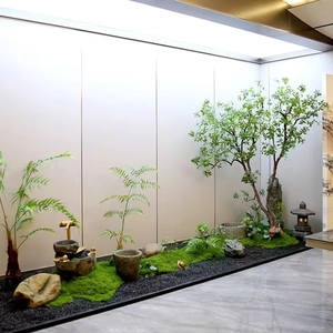 Detailed Zen indoor landscape with artificial moss, trees and stones for home decor