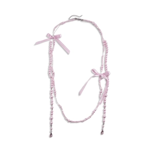 Collier de perles roses avec nœuds à pois et pendentifs en cristal en forme de goutte